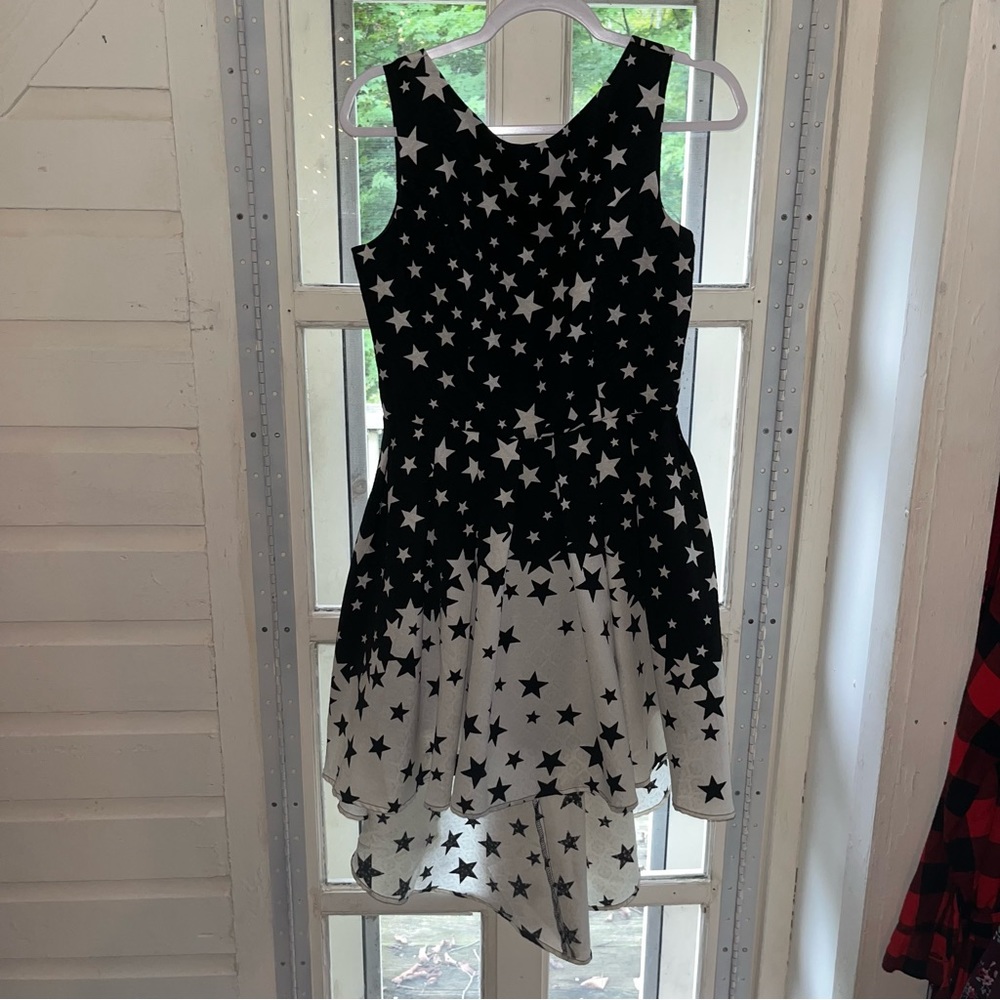 Black and white star pattern high low dress with low cut back very flowy NWT